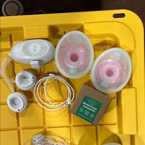 Elvie Breast Pump with Pink Accents
